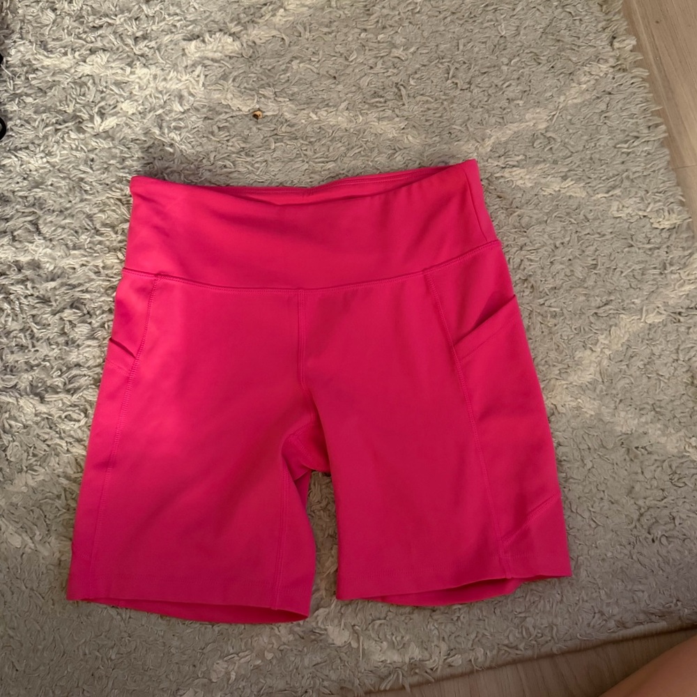New Balance Women's Hot Pink High-Rise Bike Shorts with Side Pockets
